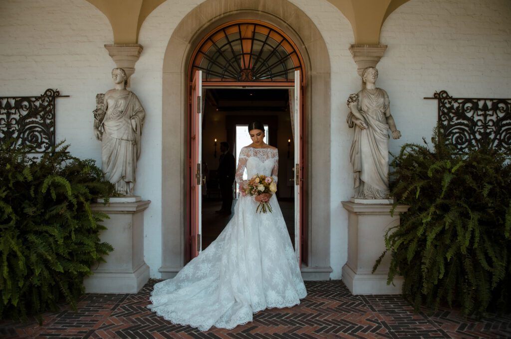 Bride in courtyard of Villa Terrace Milwaukee wedding