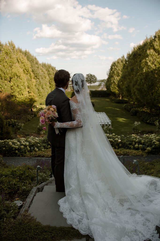 Bride and groom in garden at Villa Terrace wedding photos Milwaukee