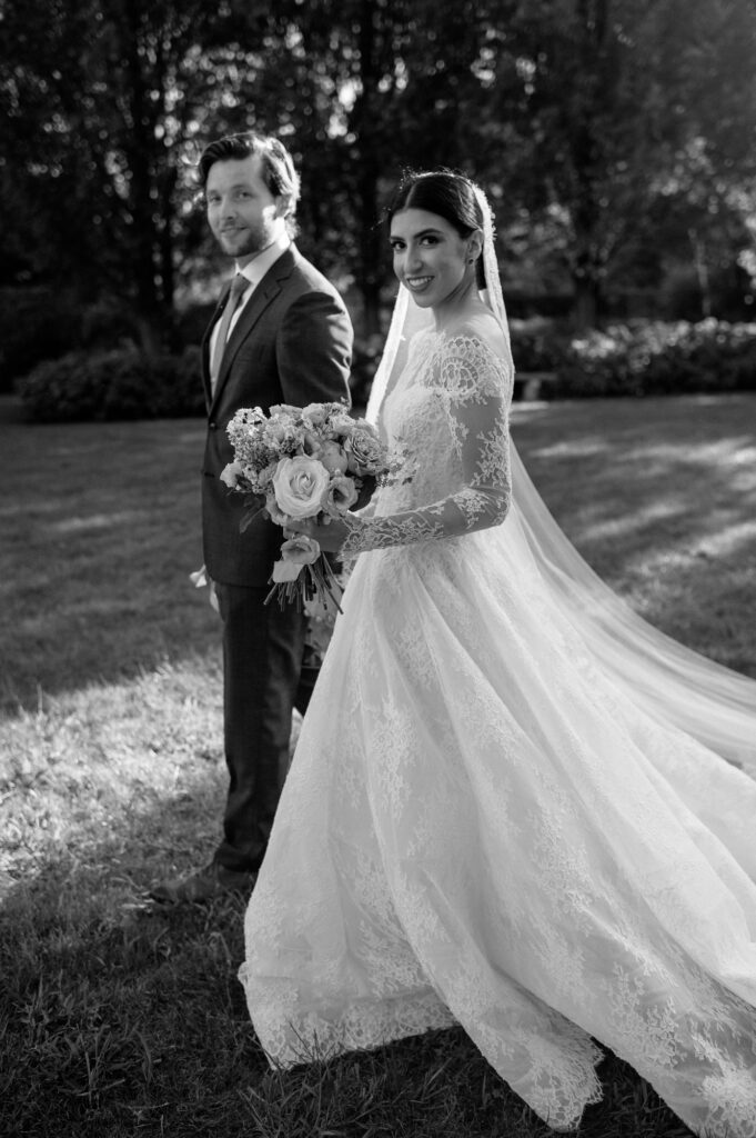 Bride and groom in garden at Villa Terrace wedding photos Milwaukee