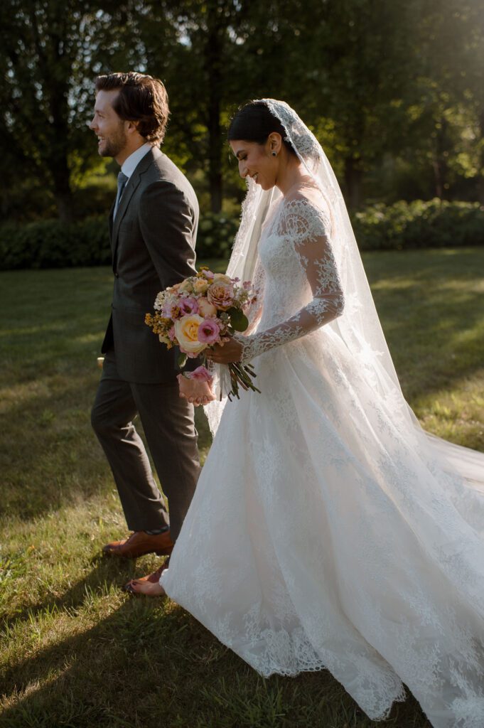 Bride and groom in garden at Villa Terrace wedding photos