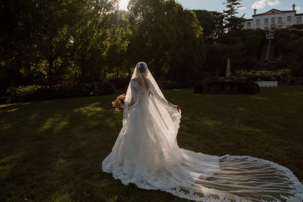 Bride in garden at Villa Terrace wedding photos Milwaukee