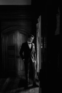 Villa Terrace Decorative Arts Museum Milwaukee, Wisconsin groom posing for a photo