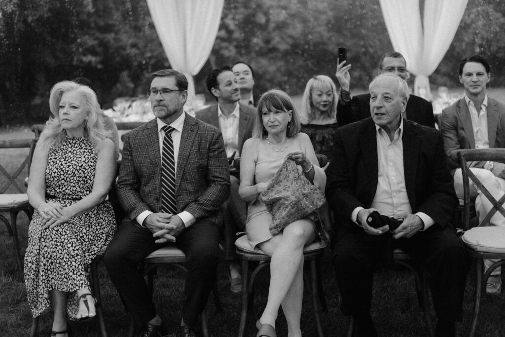Guests at wedding ceremony in Wisconsin at River Wildlife
