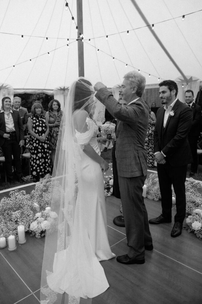 Dad giving bride away at River Wildlife wedding ceremony