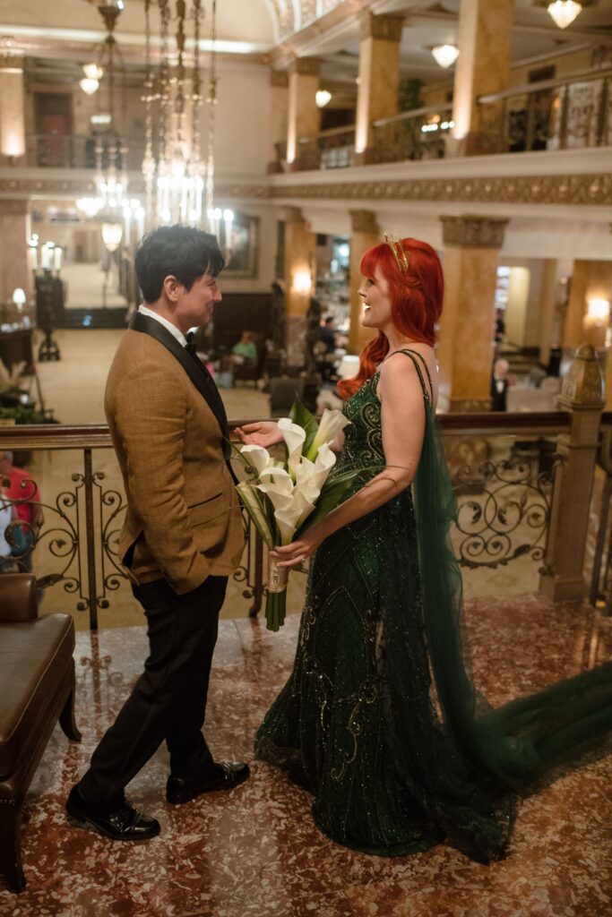 Bride and groom first look at Pfister Hotel in Milwaukee