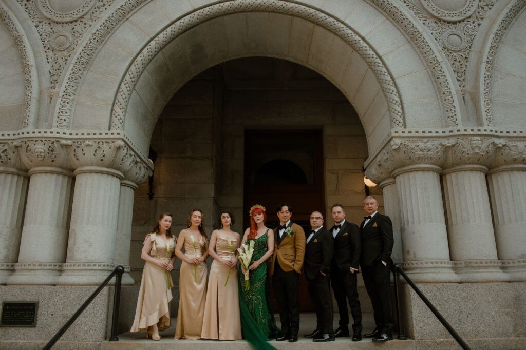 Bridal party portrait out front at the Pfister Hotel in Milwaukee