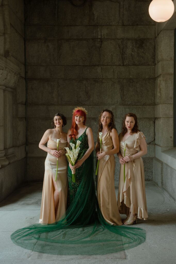 Bride and bridesmaids portrait at Pfister Hotel in Milwaukee