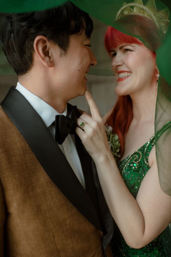 Bride and groom laugh together at the Pfister Hotel