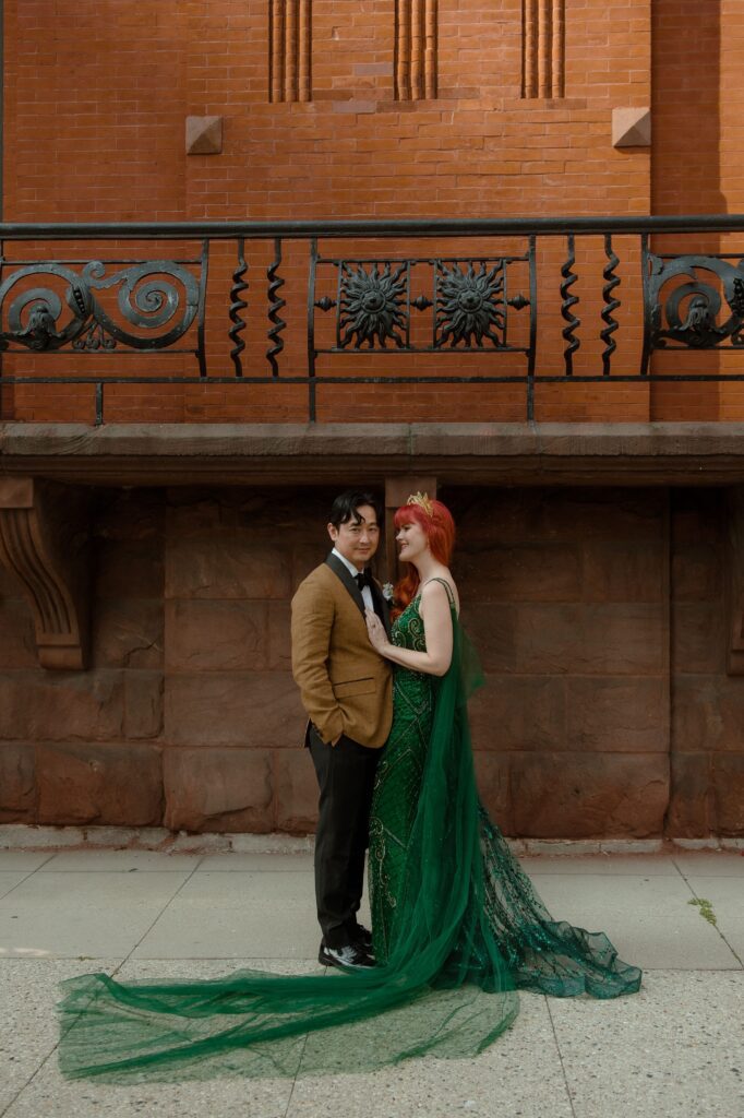 Bride and groom pose together on their wedding day in Milwaukee