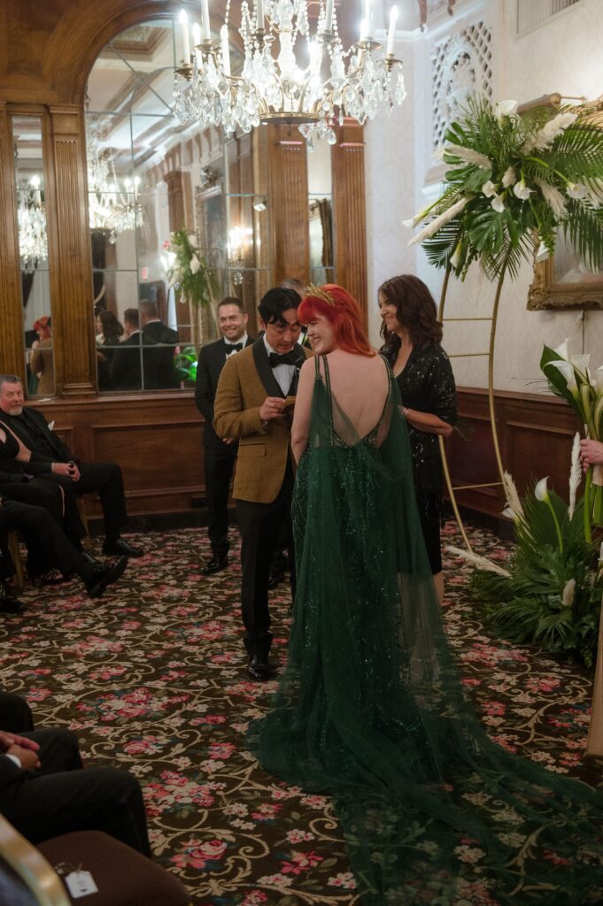 Bride and groom read their vows at the Pfister Hotel in Milwaukee
