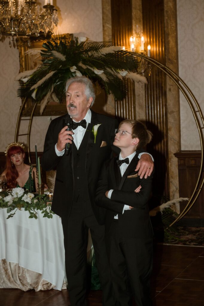 Father gives a toast at wedding reception at the Pfister Hotel in Milwaukee