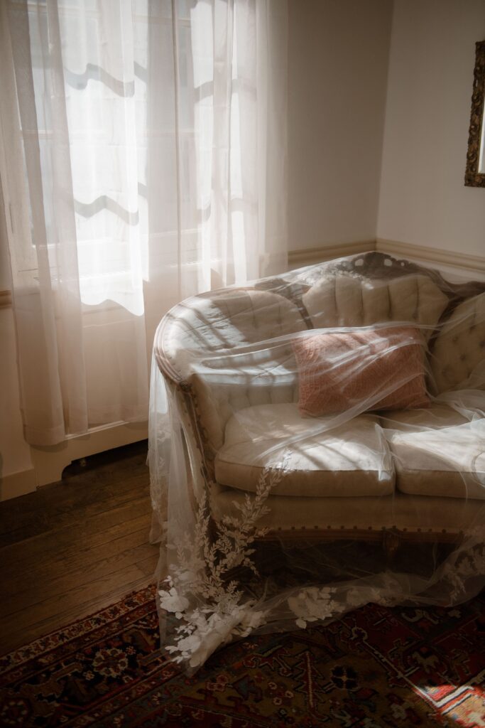 Bridal veil draped over couch