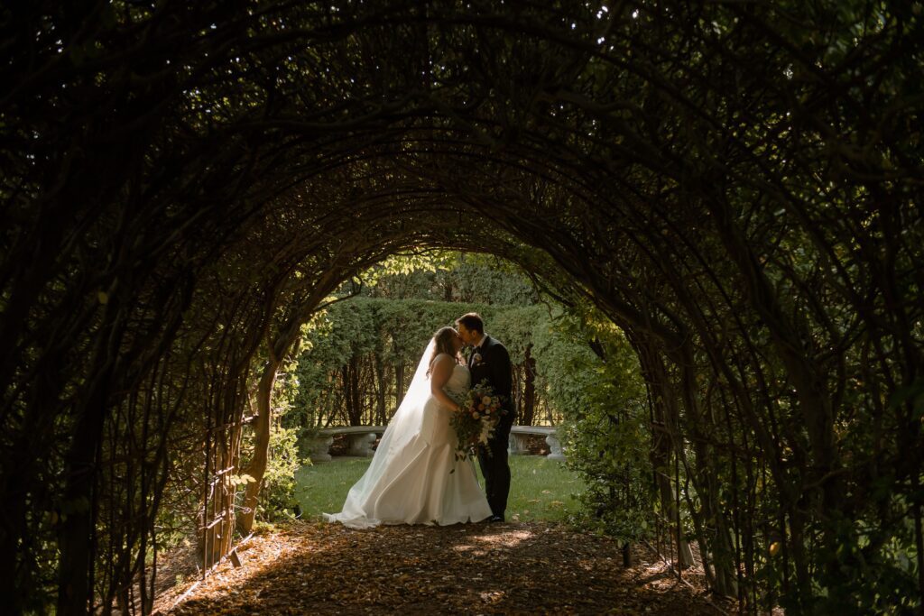 Couple kissing outdoors at Villa Terrace in Milwaukee