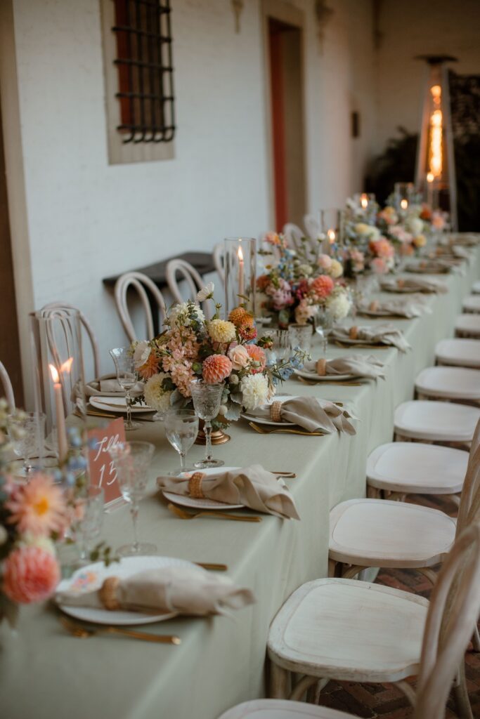 Peonies and candles at wedding reception in Milwaukee