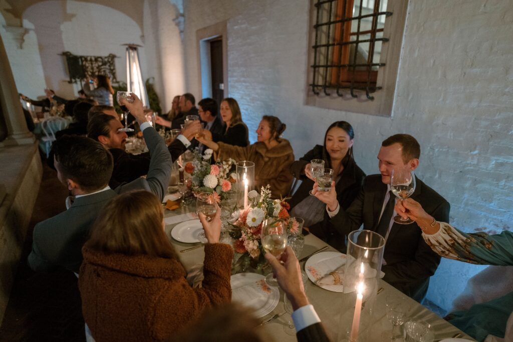 Guests toast at Milwaukee wedding reception
