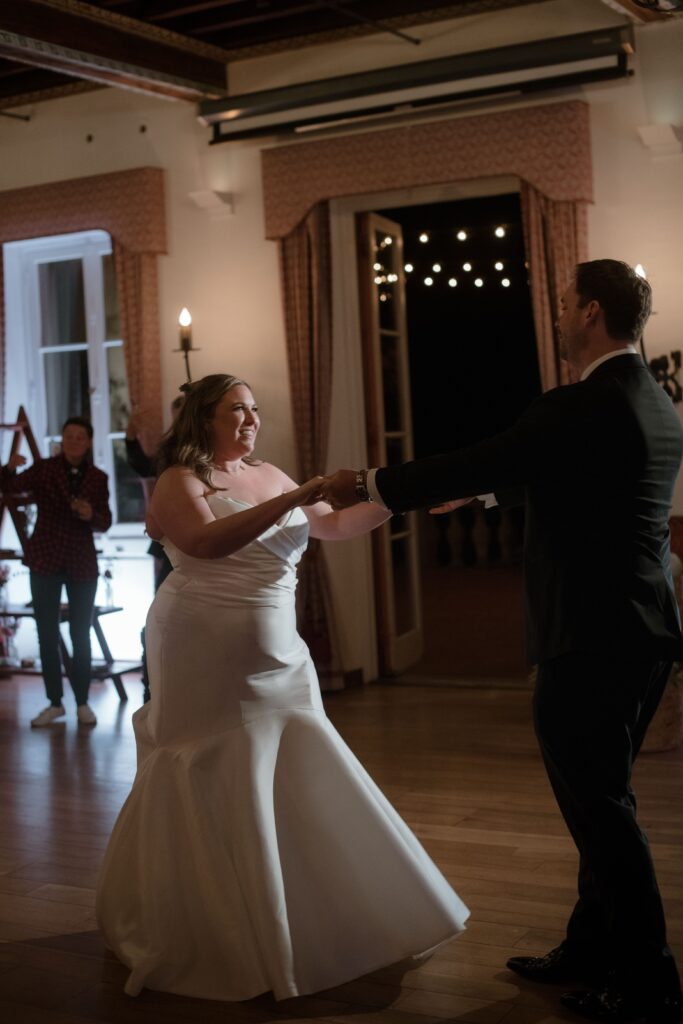 Bride and groom dance together