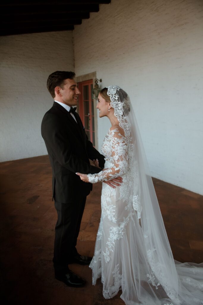 Groom sees bride during first look at Villa Terrace