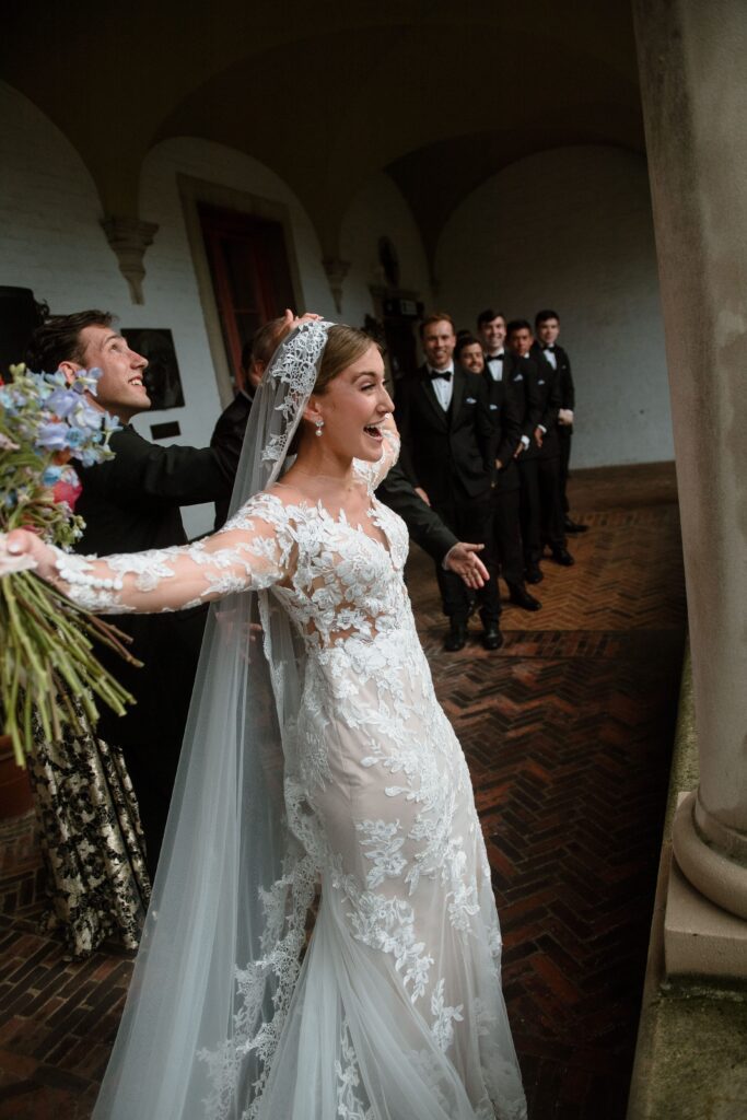 Bride is smiling and happy at wedding ceremony