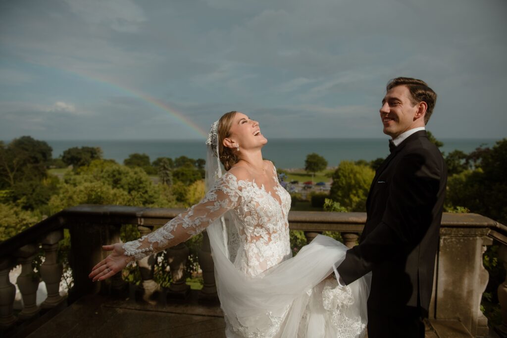 Bride and groom laugh outside Villa Terrace