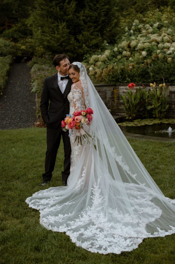 Groom kisses his bride at Villa Terrace in Milwaukee