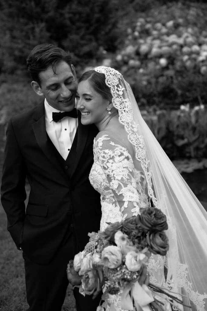 Wedding couple smile and hug at Villa Terrace in Milwaukee