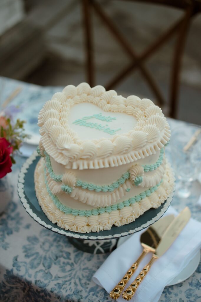 Blue and white heart shaped wedding cake