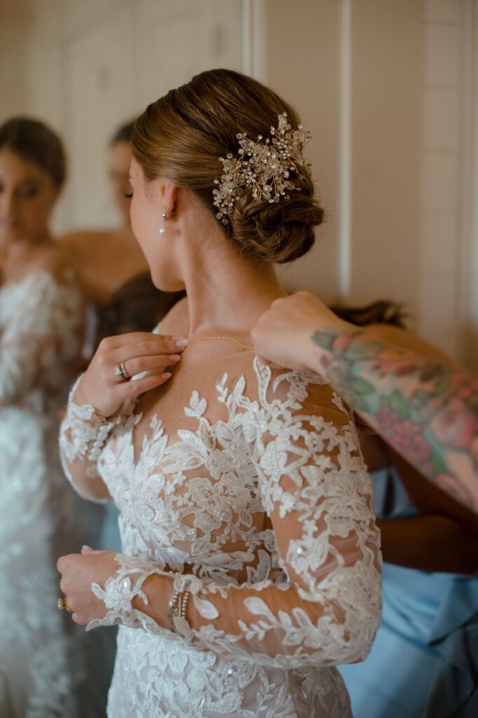 Bride getting dressed at Villa Terrace