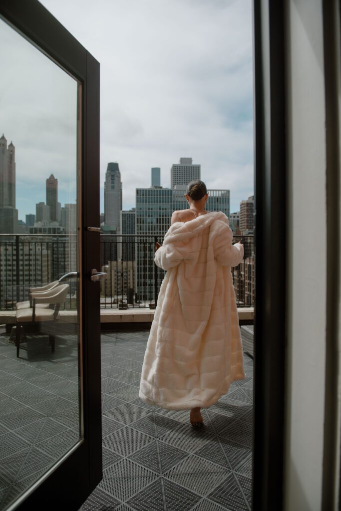 Bride getting ready in Chicago at the Ambassador Hotel before a micro wedding.