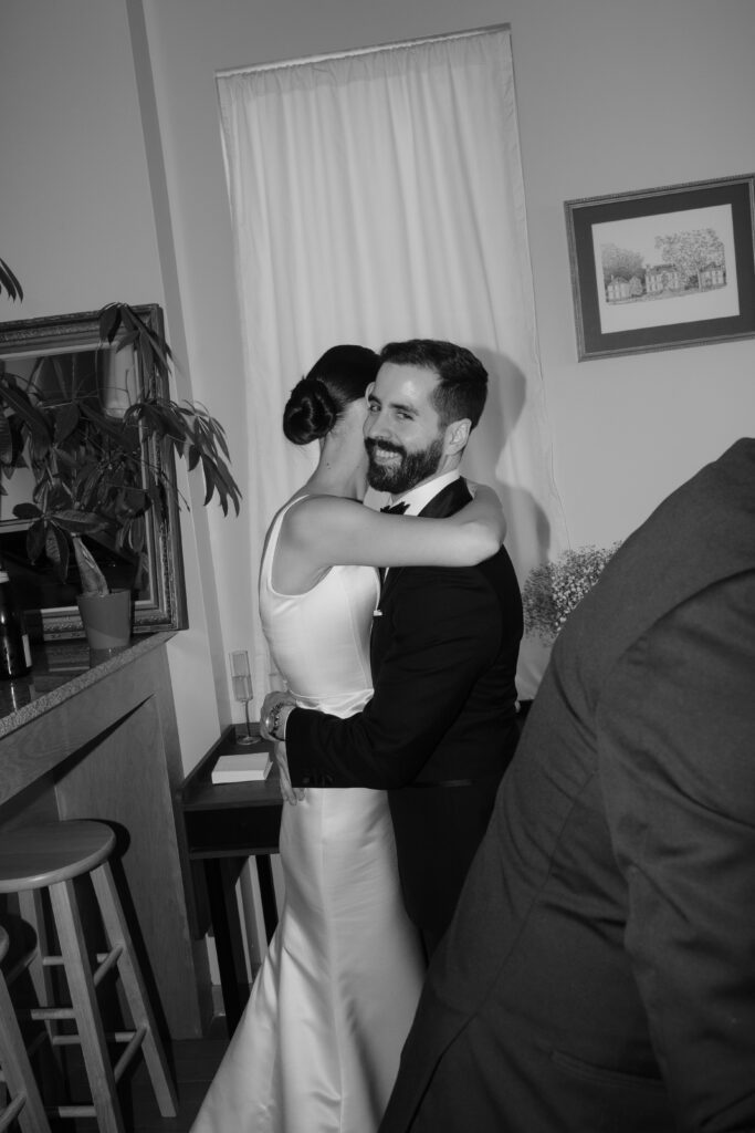 Couple embrace at micro wedding in Chicago.