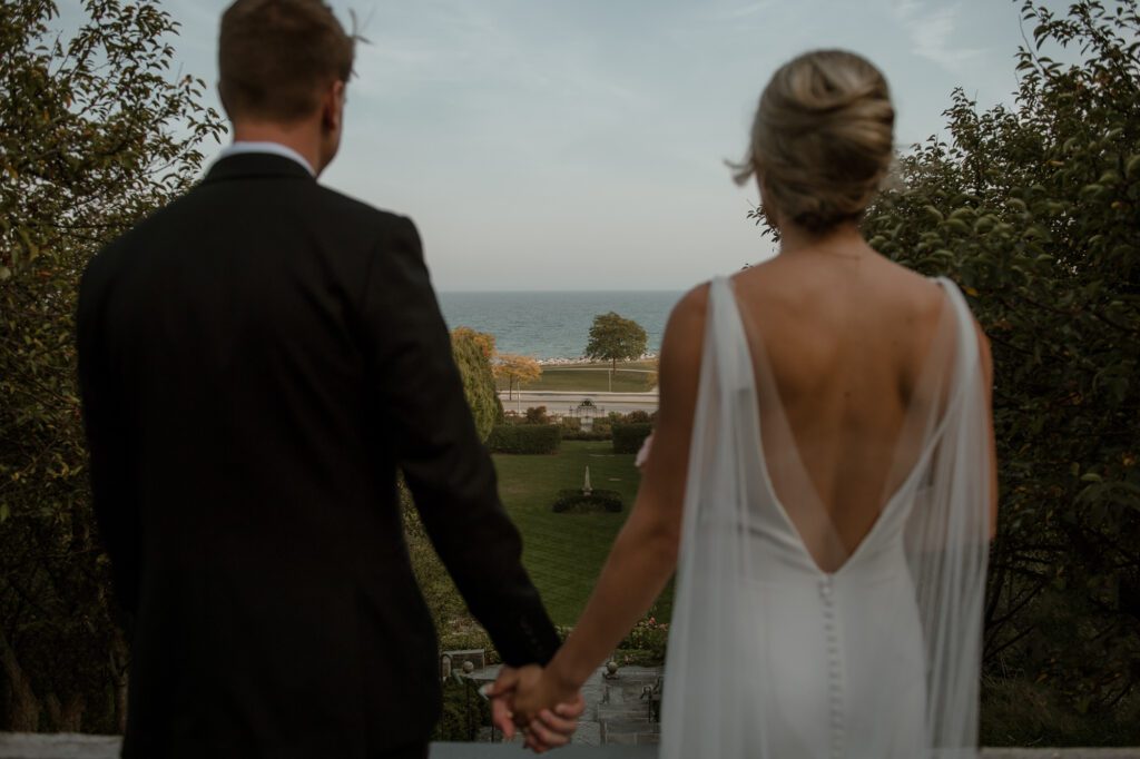 Wedding couple overlooking Villa Terrace wedding venue in Milwaukee