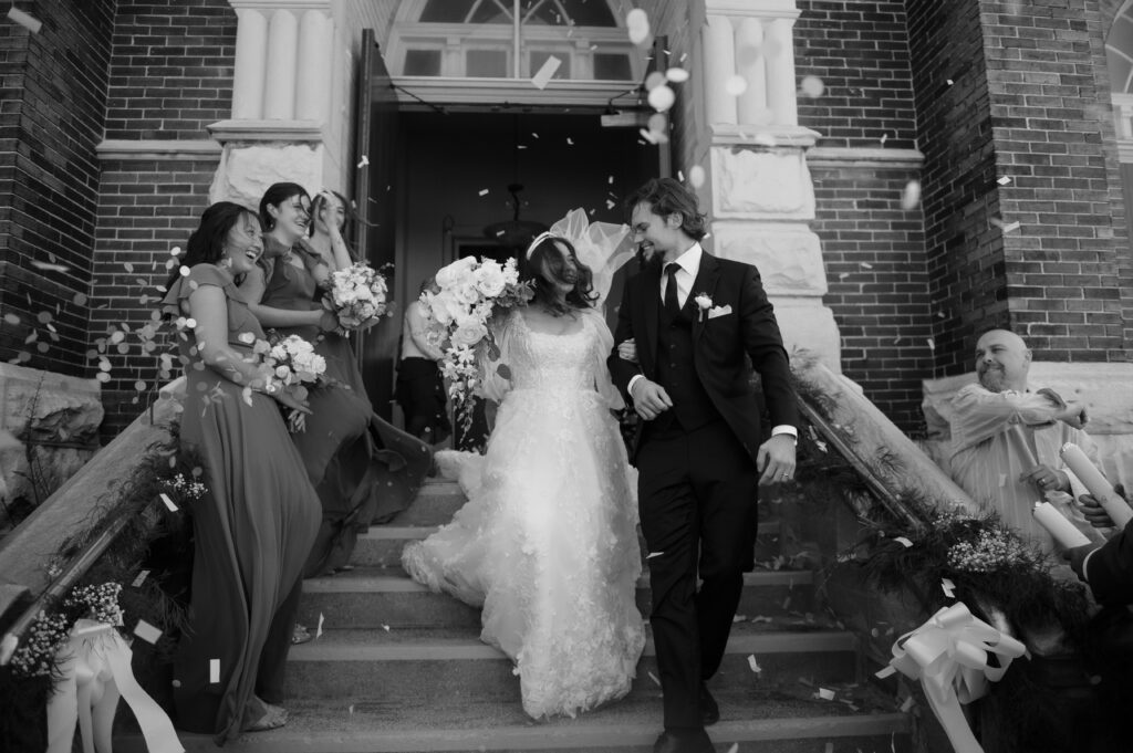 Bride and groom exit their Milwaukee Wisconsin wedding ceremony