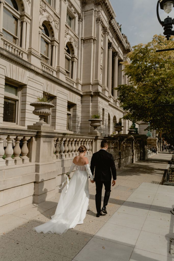 Wedding couple walking around downtown Milwaukee