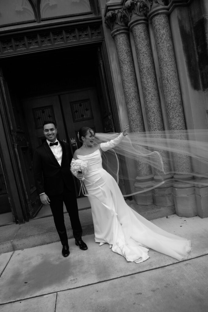 Bride and groom at St. James 1868 wedding day
